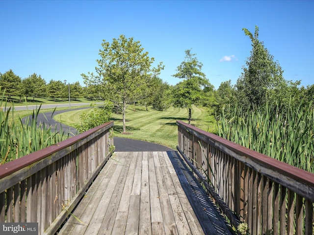 104 Barrister St, Stephenson, VA 22656 - wooden terrace with a yard and view of scattered trees