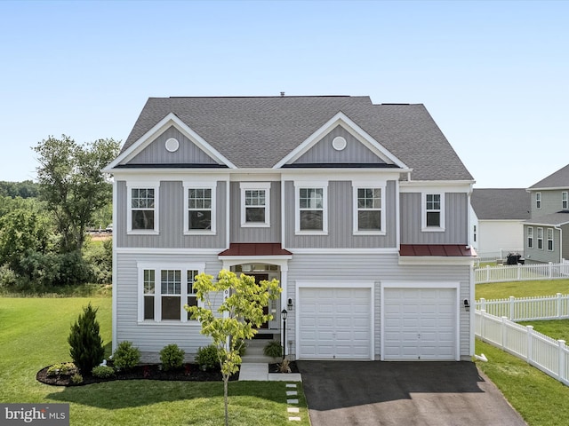 104 Barrister St, Stephenson, VA 22656 - view of front facade with driveway, a garage, board and batten siding, and roof with shingles