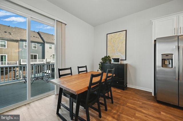 1763 Hickory Woods Rd, Dumfries, VA 22026 - dining space featuring wood finished floors and baseboards