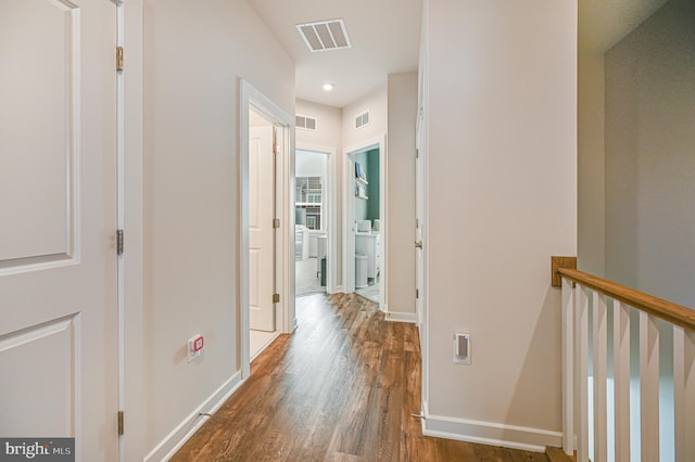 1763 Hickory Woods Rd, Dumfries, VA 22026 - hallway featuring dark wood-style floors, recessed lighting, and an upstairs landing
