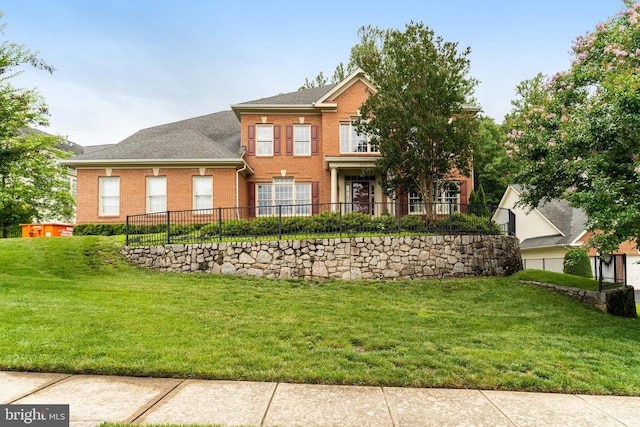8104 Chars Landing Ct, Springfield, VA 22153 - colonial house featuring brick siding, a front yard, and a shingled roof