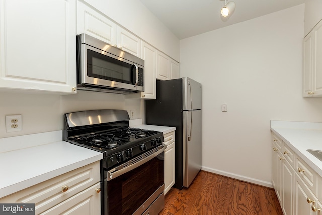 2204 Westcourt Ln Unit 201, Herndon, VA 20170 - kitchen featuring stainless steel appliances, wood finished floors, white cabinets, and light countertops
