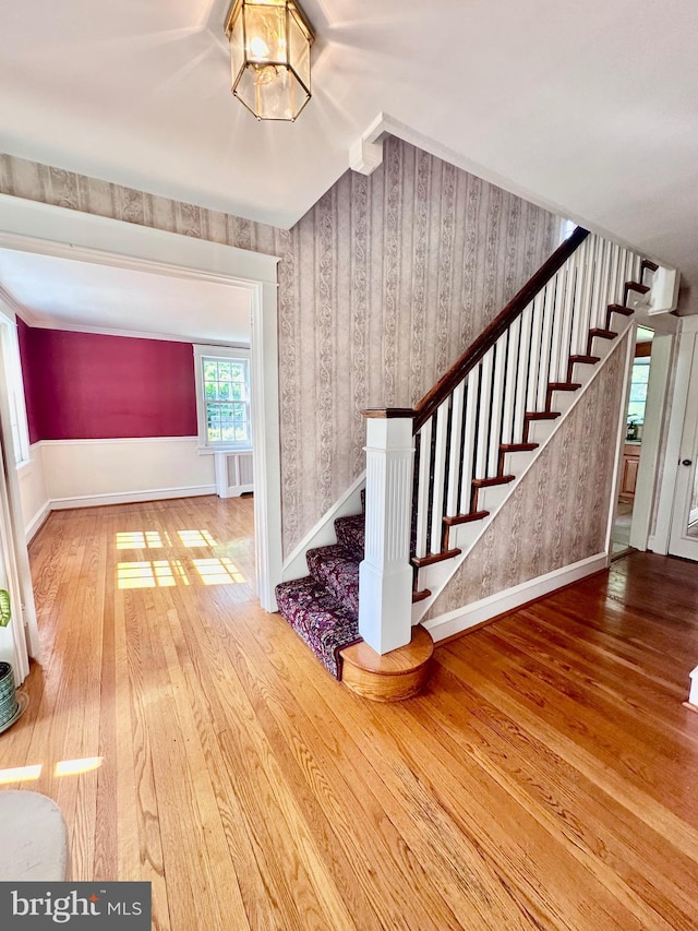 607 Harper Ave, Drexel Hill, PA 19026 - stairs with hardwood / wood-style floors, wallpapered walls, and baseboards