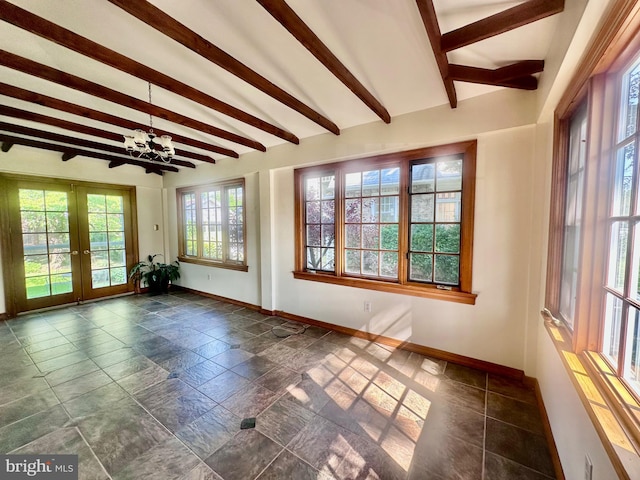 607 Harper Ave, Drexel Hill, PA 19026 - unfurnished room with baseboards, french doors, beamed ceiling, a chandelier, and dark stone finish flooring