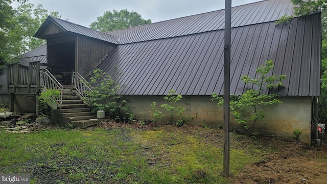 16002 Letcher Rd, Brandywine, MD 20613 - view of side of home featuring metal roof and stairs