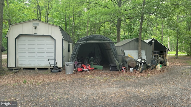 16002 Letcher Rd, Brandywine, MD 20613 - detached garage featuring a wooded view
