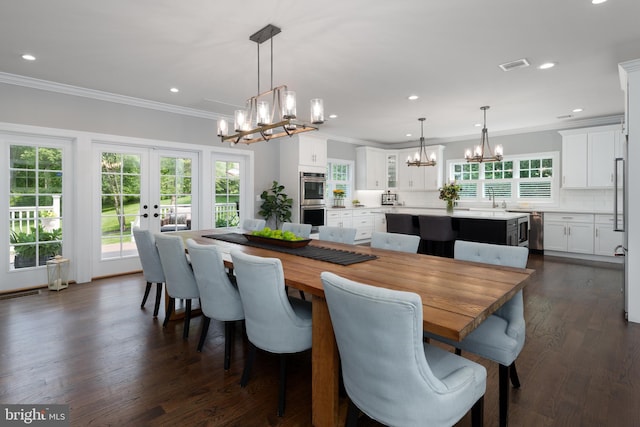 58 Haas Rd, Basking Ridge, NJ 07920 - dining room with a chandelier, crown molding, recessed lighting, dark wood-style floors, and french doors