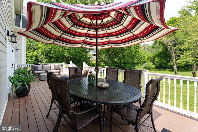 58 Haas Rd, Basking Ridge, NJ 07920 - wooden deck featuring outdoor dining area, a yard, and view of wooded area