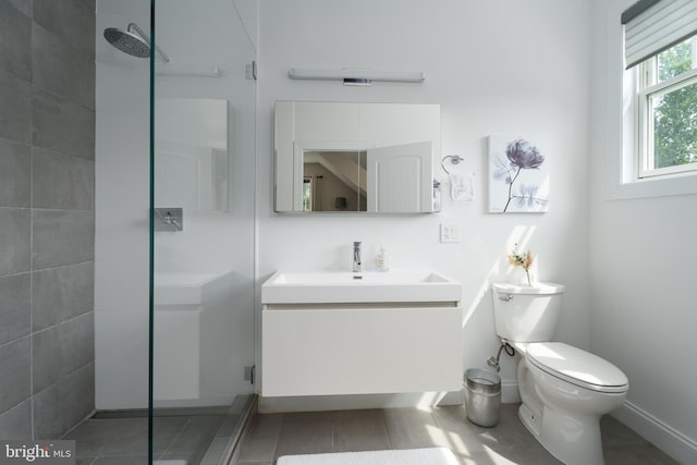 58 Haas Rd, Basking Ridge, NJ 07920 - bathroom with vanity, a tile shower, toilet, baseboards, and tile patterned floors