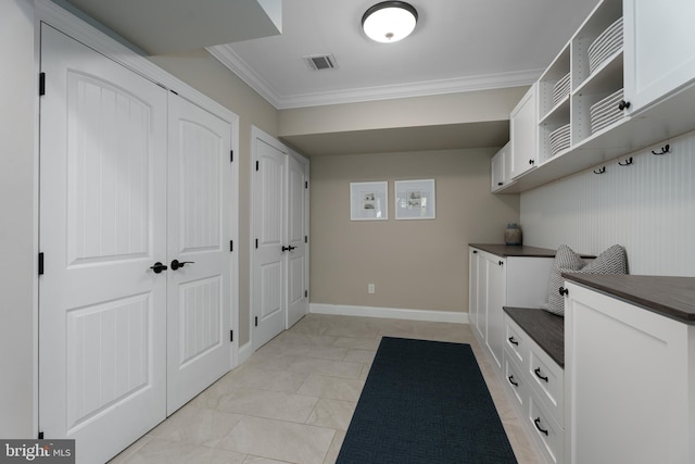 58 Haas Rd, Basking Ridge, NJ 07920 - laundry room featuring ornamental molding and baseboards