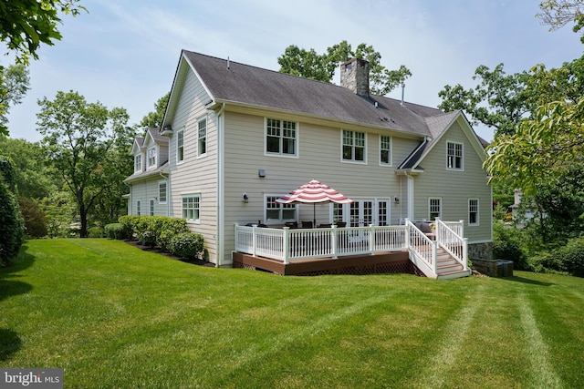 58 Haas Rd, Basking Ridge, NJ 07920 - back of property with a chimney, a deck, and a lawn