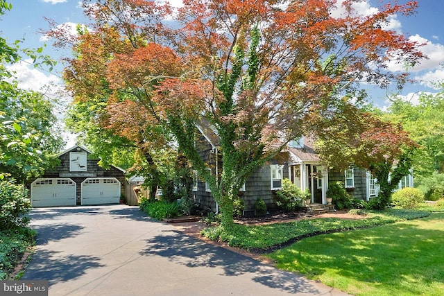726 Forest Grove Rd, Wycombe, PA 18980 - obstructed view of property featuring a front lawn, driveway, and an outbuilding
