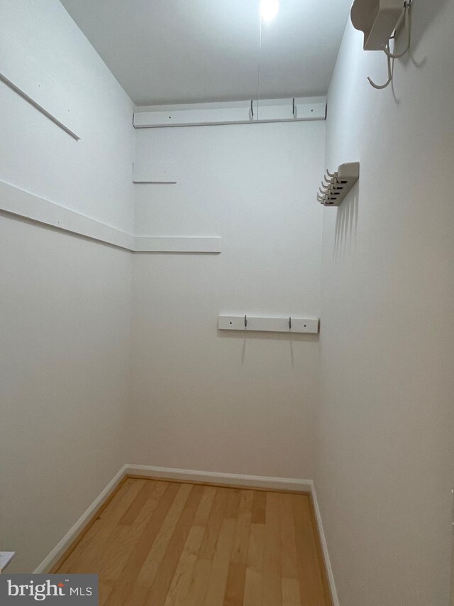 700 7th St SW Unit 403, Washington, DC 20024 - walk in closet with light wood-style floors
