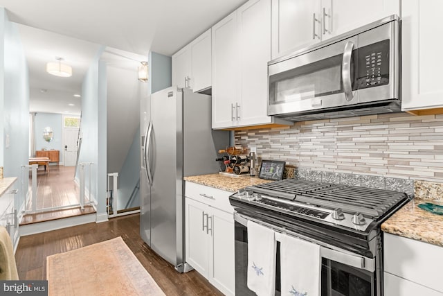 206 E Randall St, Baltimore, MD 21230 - kitchen featuring appliances with stainless steel finishes, dark wood-style flooring, white cabinetry, and recessed lighting