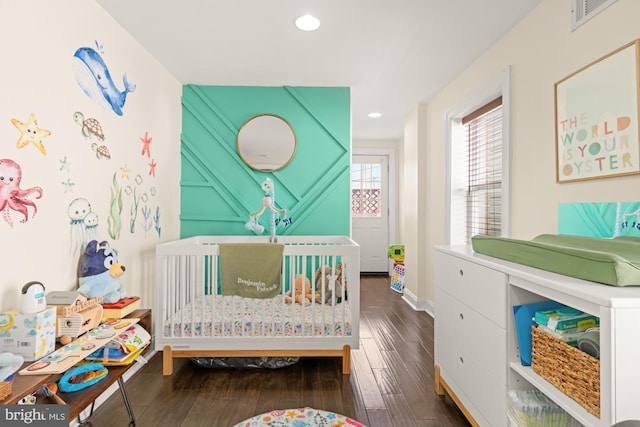 206 E Randall St, Baltimore, MD 21230 - bedroom featuring dark wood-style flooring, recessed lighting, and baseboards