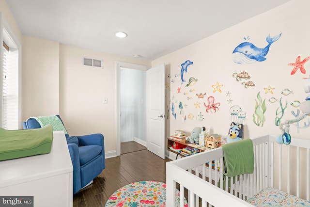 206 E Randall St, Baltimore, MD 21230 - bedroom featuring hardwood / wood-style flooring, a nursery area, recessed lighting, and baseboards