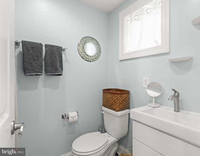 206 E Randall St, Baltimore, MD 21230 - half bathroom featuring toilet and vanity