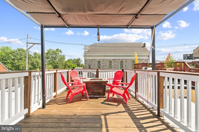206 E Randall St, Baltimore, MD 21230 - wooden terrace with an outdoor fire pit
