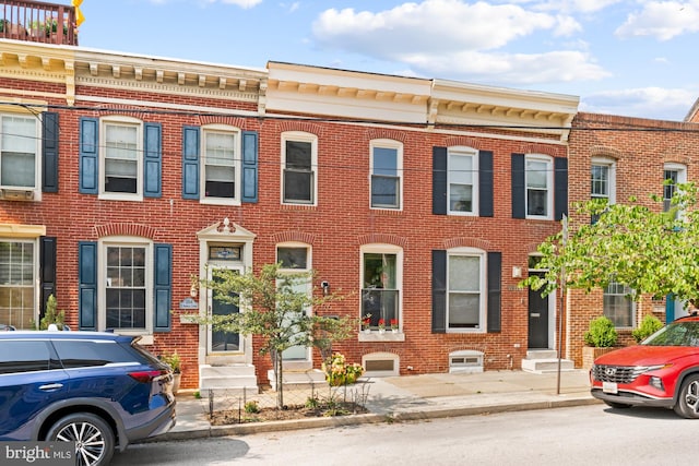 206 E Randall St, Baltimore, MD 21230 - view of property featuring entry steps and brick siding
