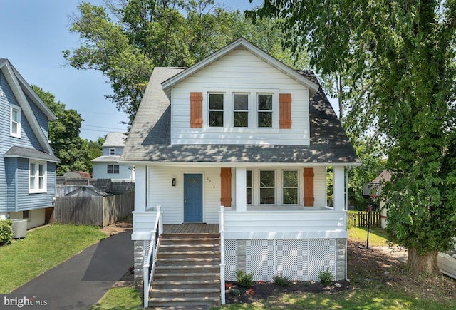 2912 Bauernwood Ave, Baltimore, MD 21234 - view of front facade with covered porch and a shingled roof