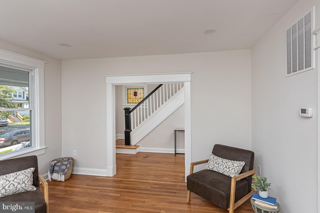 2912 Bauernwood Ave, Baltimore, MD 21234 - sitting room featuring wood finished floors, stairway, and baseboards