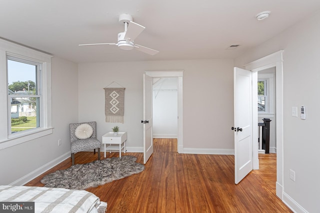 2912 Bauernwood Ave, Baltimore, MD 21234 - living area featuring wood finished floors, a ceiling fan, and baseboards