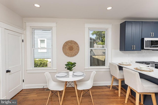 2912 Bauernwood Ave, Baltimore, MD 21234 - dining space featuring wood finished floors, baseboards, and recessed lighting