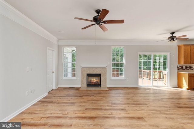 35510 Somerset Ridge Rd, Locust Grove, VA 22508 - unfurnished living room featuring a ceiling fan, light wood-type flooring, a fireplace, and crown molding