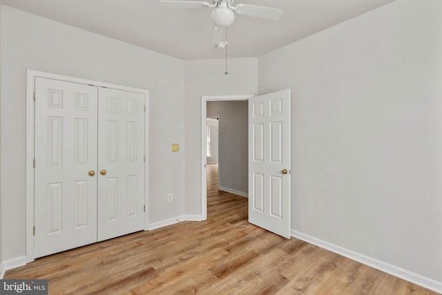 35510 Somerset Ridge Rd, Locust Grove, VA 22508 - unfurnished bedroom with light wood finished floors, a closet, and ceiling fan