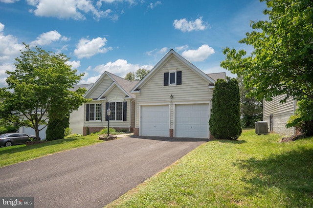 35510 Somerset Ridge Rd, Locust Grove, VA 22508 - view of front facade with asphalt driveway, a garage, and a front yard