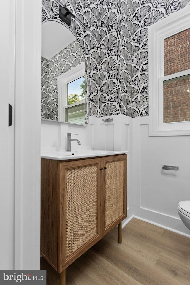 26 Jefferson Rd, Princeton, NJ 08540 - bathroom with wallpapered walls, vanity, toilet, and wood finished floors