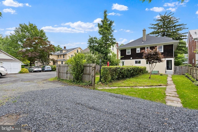 26 Jefferson Rd, Princeton, NJ 08540 - view of front facade with a chimney and a residential view