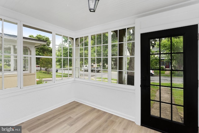 26 Jefferson Rd, Princeton, NJ 08540 - unfurnished sunroom with wood finished floors, ornamental molding, and baseboards