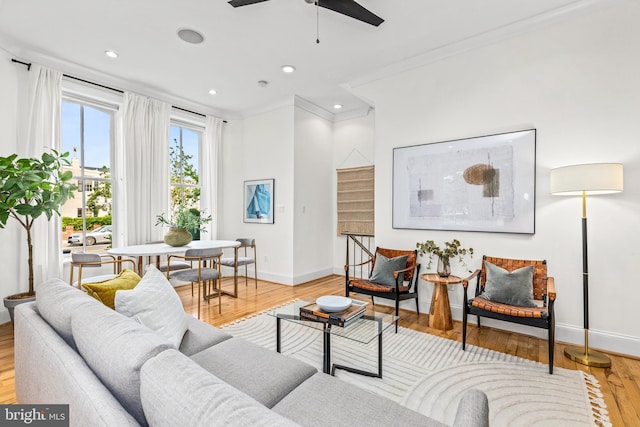 1235 S St NW Unit 1, Washington, DC 20009 - living area with baseboards, wood finished floors, ceiling fan, recessed lighting, and crown molding