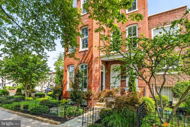 1235 S St NW Unit 1, Washington, DC 20009 - townhome / multi-family property featuring brick siding