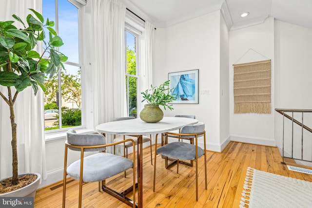 1235 S St NW Unit 1, Washington, DC 20009 - dining room with light wood-style floors, healthy amount of natural light, and baseboards