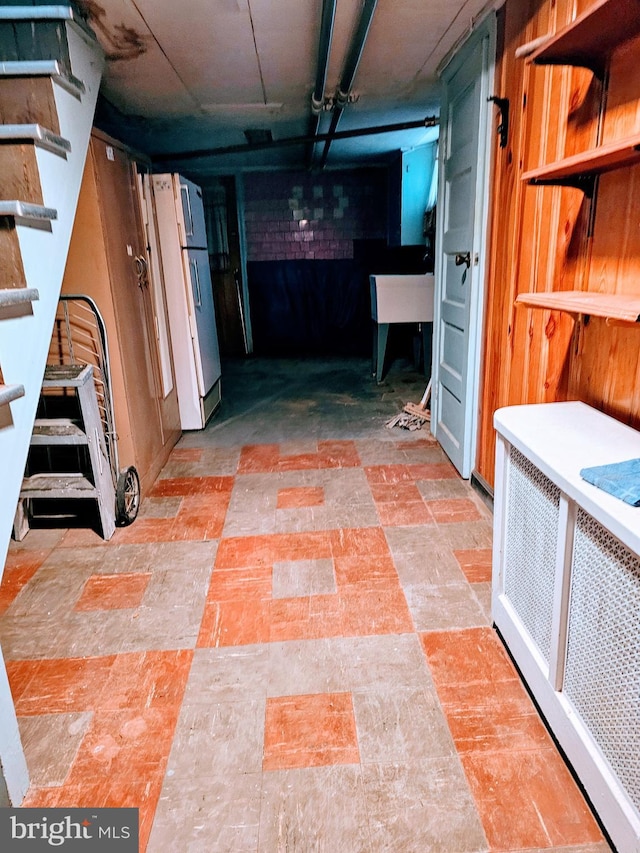 1943 W Sparks St, Philadelphia, PA 19141 - finished below grade area with stairway and freestanding refrigerator