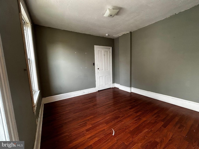 342 S 4th St, Reading, PA 19602 - unfurnished room featuring dark wood-type flooring and baseboards