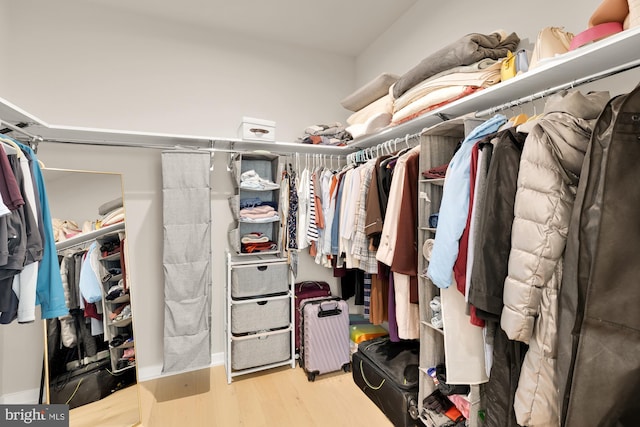 7458 Backett Wood Ter Unit 401, Mclean, VA 22102 - walk in closet featuring wood finished floors