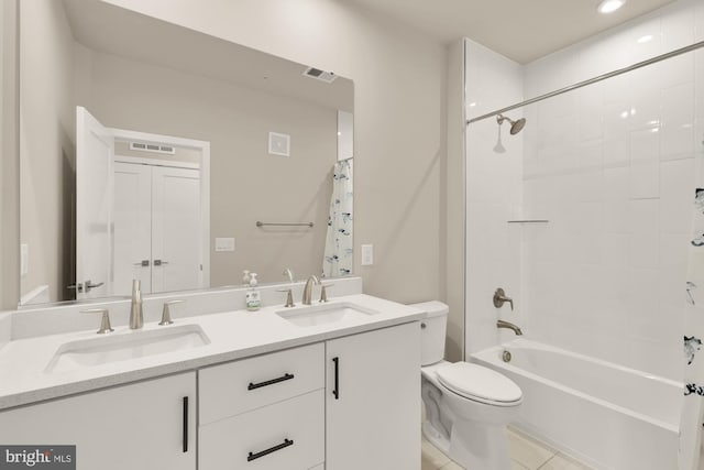 7458 Backett Wood Ter Unit 401, Mclean, VA 22102 - full bath featuring double vanity, toilet, shower / bathtub combination with curtain, and tile patterned floors