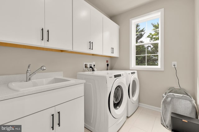 7458 Backett Wood Ter Unit 401, Mclean, VA 22102 - laundry area featuring cabinet space, independent washer and dryer, baseboards, and light tile patterned flooring