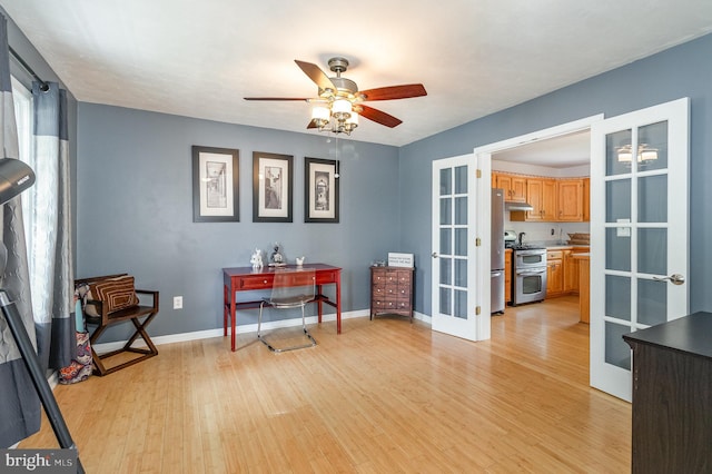 349 Lexington Way, Littlestown, PA 17340 - office area featuring french doors, light wood-style floors, ceiling fan, and baseboards