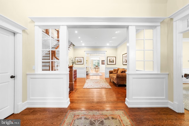 4491 Province Line Rd, Princeton, NJ 08540 - entrance foyer featuring wood finished floors, stairway, wainscoting, ornamental molding, and a decorative wall