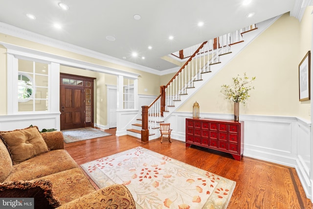 4491 Province Line Rd, Princeton, NJ 08540 - entryway with stairway, wood finished floors, crown molding, a wainscoted wall, and recessed lighting