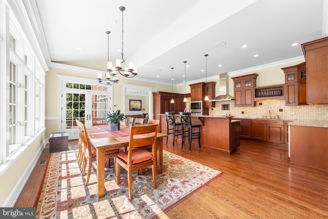 4491 Province Line Rd, Princeton, NJ 08540 - dining space with light wood finished floors, a chandelier, crown molding, and recessed lighting