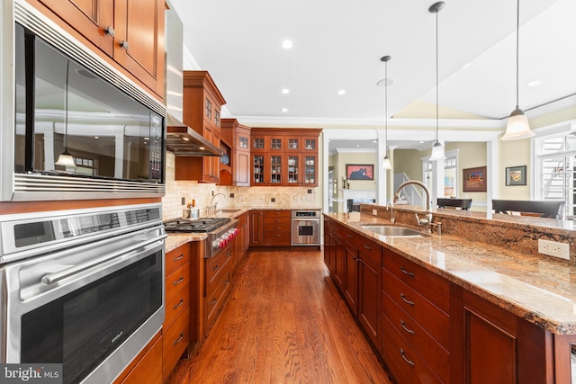 4491 Province Line Rd, Princeton, NJ 08540 - kitchen featuring stainless steel appliances, a sink, dark wood-style floors, wall chimney exhaust hood, and glass insert cabinets