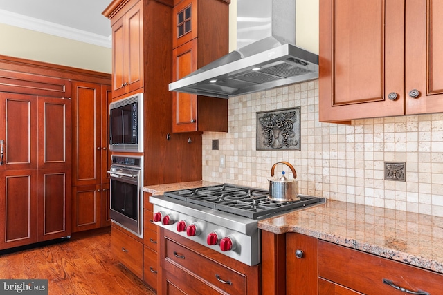 4491 Province Line Rd, Princeton, NJ 08540 - kitchen with appliances with stainless steel finishes, wall chimney exhaust hood, crown molding, light stone countertops, and backsplash