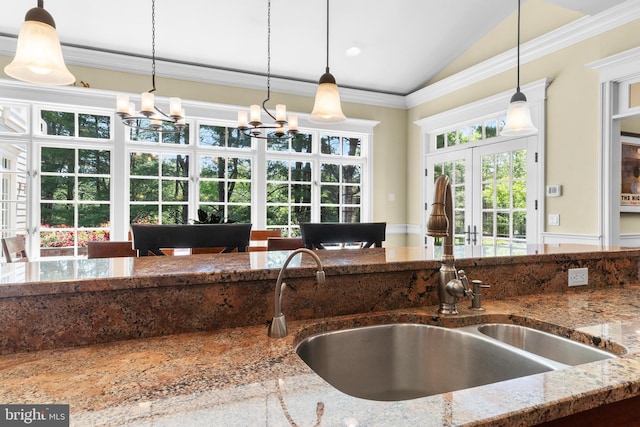 4491 Province Line Rd, Princeton, NJ 08540 - kitchen with vaulted ceiling, stone countertops, a sink, decorative light fixtures, and a chandelier