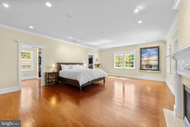 4491 Province Line Rd, Princeton, NJ 08540 - bedroom with a premium fireplace, light wood-style flooring, crown molding, baseboards, and recessed lighting