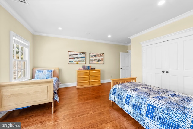 4491 Province Line Rd, Princeton, NJ 08540 - bedroom with wood finished floors, ornamental molding, recessed lighting, baseboards, and a closet